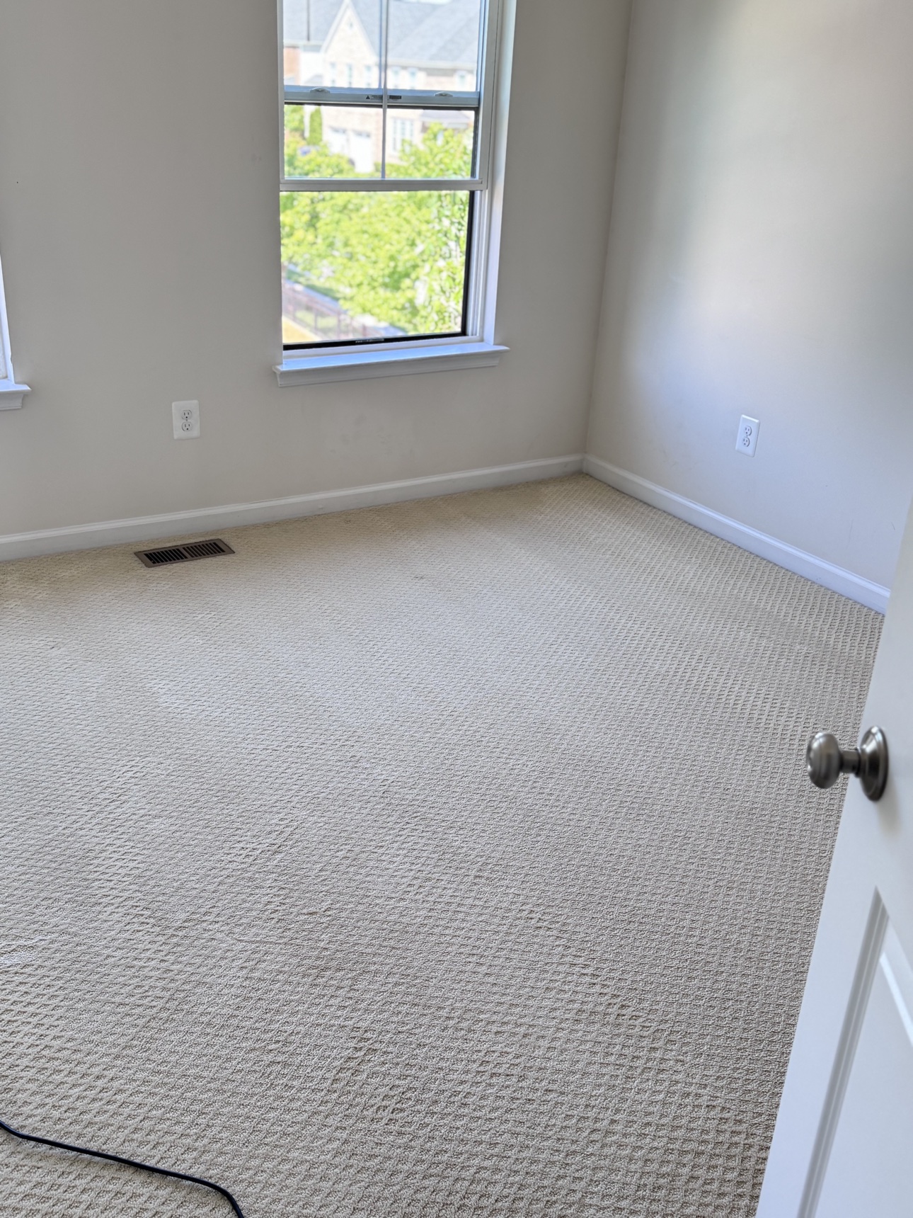Bright finished bedroom after cleaning by The Clean Squad